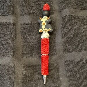Red and Black Decorative Pen
